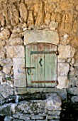 LA CHABAUDE  FRANCE. DESIGNER - PHILIPPE COTTET: DETAIL OF SMALL DOOR IN WALL