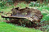 NATURALISTIC BENCH IN THE WOODLAND. GREYSTONE COTTAGE  OXFORDSHIRE