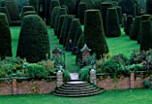 PACKWOOD HOUSE  WARWICKSHIRE: THE TOPIARY GARDEN IN WINTER SEEN FROM THE HOUSE