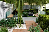 DECKING PATH  AND BOX YEW HEDGING IN HIS LATE HIGHNESS SHAIKH ZAYED BIN SULTAN AL-NAYHANS GARDEN BY CHRISTOPHER BRADLEY-HOLE. CHELSEA 2005