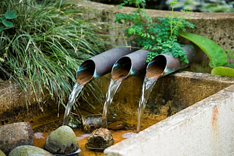 WATER_FEATURE_THREE_PIPES_SPILLING_WATER_INTO_A_RILL_WINGWELL_NURSERY___RUTLAND