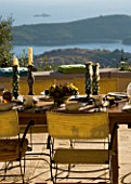 GINA PRICES GARDEN  CORFU: VIEW FROM THE TERRACE ACROSS THE TABLE TO THE IONIAN SEA