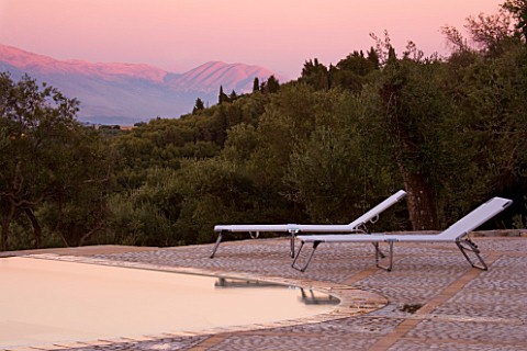 GINA_PRICES_GARDEN__CORFU_VIEW_ACROSS_THE_INFINITY_POOL_TO_THE_IONIAN_SEA_AND_ALBANIAN_MOUNTAINS