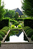 WOLLERTON OLD HALL GARDEN  SHROPSHIRE: THE RILL WITH BOX BALLS AND BOX BALLS AND YEW HEDGING