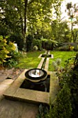 CHALICE SUNDIAL IN POOL WITH RILL  BY DAVID HARBER  WITH LAWN
