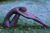 GARDEN DESIGNED BY DUNCAN HEATHER: SCULPTURE BY HELEN SINCLAIR ON THE FROSTY LAWN