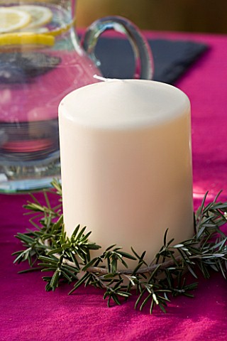 BARBEQUE_PROJECT_CANDLE_ON_TABLE_WITH_ROSEMARY_GARLAND_DESIGNER_CLARE_MATTHEWS
