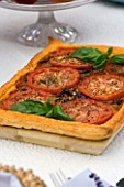 DESIGNER CLARE MATTHEWS: VEGETARIAN TART MADE WITH TOMATOES AND RED ONIONS