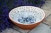 DESIGNER: CLARE MATTHEWS - BUBBLING BOWL PROJECT: TERRACOTTA CONTAINER WATER FEATURE ON PATIO BESIDE LAVENDER