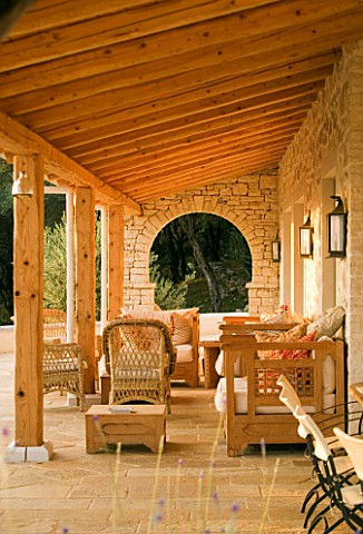 COMFORTABLE_SOFAS_AND_CHAIRS_ON_PATIO_IN_GINA_PRICES_CORFU_GARDEN