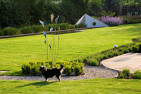 RICHARD_JACKSONS_GARDEN_LAWN_AND_BORDER_PLANTED_WITH_NEPETA_WALKERS_LOW_WATER_RILL_AND_METAL_SAILS_G