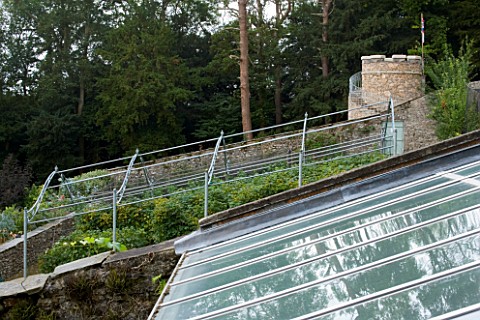 YEWBARROW_HOUSE_GARDENS__CUMBRIA__THE_WALLED_VEGETABLE_GARDEN_WITH_THE_NEW_ROUND_TOWER_IN_THE_BACKGR