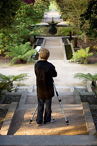 HOLKER_HALL__CUMBRIA__BOY_AGED_13_WITH_TRIPOD_PHOTOGRAPHING_THE_LIMESTONE_CASCADE