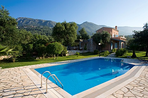 CORFU__GREECE_MALAMA_HOUSE_NEAR_BARBATI_VIEW_TO_THE_HOUSE_WITH_SWIMMING_POOL_IN_THE_FOREGROUND