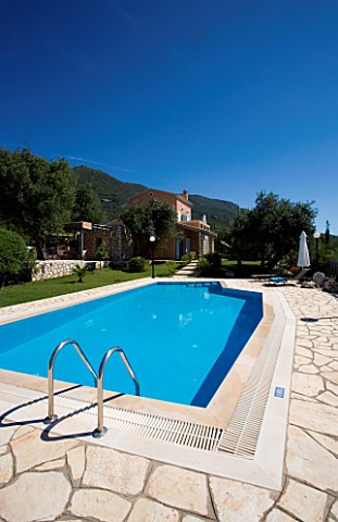 CORFU__GREECE_MALAMA_HOUSE_NEAR_BARBATI_VIEW_TO_THE_HOUSE_WITH_SWIMMING_POOL_IN_THE_FOREGROUND