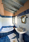CORFU  GREECE. MALAMA HOUSE NEAR BARBATI. BATHROOM OF THE MASTER BEDROOM WITH SINK AND BATH