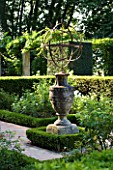 DESIGNER DOMINIQUE LAFOURCADE  PROVENCE  FRANCE - METAL SUNDIAL ON STRONE PLINTH IN THE FORMAL ROSE GARDEN