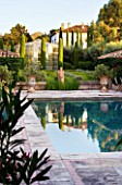 DESIGNER MICHEL SEMINI  PROVENCE  FRANCE. VIEW OF THE SWIMMING POOL AND GLASSHOUSE