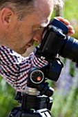 CLIVE NICHOLS IN HIS GARDEN WITH MANFROTTO 058B TRIPOD AND 410 GEARED HEAD