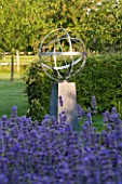DAVID HARBER SUNDIALS: STAINLESS STEEL ARMILLARY SPHERE SUNDIAL SURROUNDED BY LAVENDER