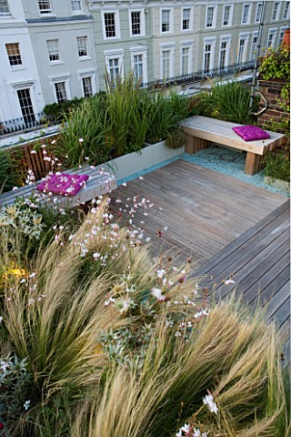 ROOF_GARDEN_HOLLAND_PARK_LONDONDESIGNER_CHARLOTTE_ROWEDECKED_TERRACE_WOODEN_BENCHES_PINK_CUSHIONS_BL