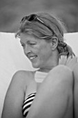JANE NICHOLS RELAXING ON DECKCHAIR IN CORFU. BALCK AND WHITE IMAGE