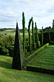 THROUGHAM COURT  GLOUCESTERSHIRE. DESIGNER: CHRISTINE FACER: TOPIARY BESIDE THE CROQUET LAWN
