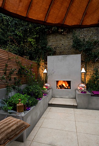 DESIGNER__CHARLOTTE_ROWE__LONDON_CHARLOTTE_ROWES_OWN_GARDEN_AT_NIGHT__VIEW_OUT_OF_BACK_DOOR_ACROSS_P