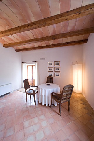 SON_BERNADINET_HOTEL__NEAR_CAMPOS__MALLORCA_SUITEDO_THE_DINING_ROOM_WITH_TABLE_AND_CHAIRS
