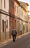 SUITE.DO. STREET SCENE WITH OLD MAN WALKING  SANTANYI  MALLORCA  SPAIN