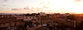 SUITE.DO. VIEW ACROSS THE ROOFTOPS OF CAMPOS AT DAWN. MALLORCA  SPAIN