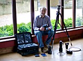 CLIVE NICHOLS WITH HIS CAMERA KIT