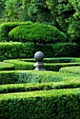 PROVENCE  FRANCE - ALTAVES. BOX TOPIARY GARDEN WITH ORNAMENTAL STONE SCULPTURE