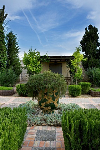 PRIVATE_GARDEN__PROVENCE__FRANCE__DESIGNER_DOMINIQUE_LAFOURCADE_POTAGER_WITH_CLIPPED_ROSEMARY_AND_PR