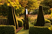 DAVID HARBER SUNDIALS: STAINLESS STEEL OBELISK SUNDIAL AT PETTIFERS  OXFORDSHIRE  IN THE PARTERRE WITH YEW TOPIARY AND BOX HEDGING