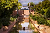 LA NORIA  FRANCE. GARDEN DESIGNED BY ARNAUD MAURIERES AND ERIC OSSART - WATER GARDEN - ISLAMIC STYLE GARDEN WITH RILL AND COVERED SEATING AREA (KIOSQUE)