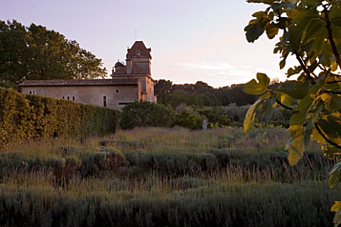 CHATEAU_PLAISIR__FRANCE__DESIGNER_PASCAL_CRIBIER__VIEW_OF_THE_CHATEAU_FROM_THE_LAVENDER_FIELD_AND_VI