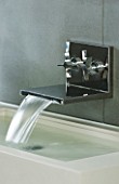 TANIA LAURIE  LONDON. STYLISH  CONTEMPORARY CHROME WALL MOUNTED TAP