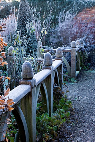 WOLLERTON_OLD_HALL__SHROPSHIRE_WINTER_GARDEN_IN_FROST___BEAUTIFUL_OAK_FINIALS_ON_BALUSTRADES_IN_THE_