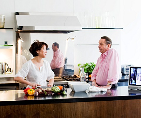JOHN_MINSHAW_AND_HIS_WIFE_IN_THE_KITCHEN