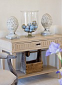 DESIGNER: CLAIRE SKINNER  ROU ESTATE  CORFU: HOUSE INTERIOR - LIVING ROOM IN GREY AND CREAM. SIDEBOARD WITH GLASS JAR