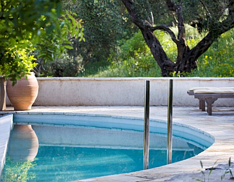 THE_ROU_ESTATE__CORFU_DAWN_LIGHT_ON_THE_PLUNGE_POOL_AND_THE_SWIMMING_POOL