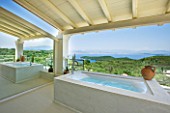 THE KAPARELLI ESTATE  CORFU - UNDERCOVER JACUZZI/HOT TUB ON RAISED STONE PATIO WITH MIRRORED WALL
