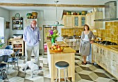 DESIGNER: ANNE FOWLER - THE KITCHEN - ALAN WITH DOG AND ANNE FOWLER