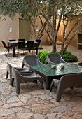 DESIGNERS ERIC OSSART AND ARNAUD MAURIERES  MOROCCO: AL HOSSOUN - A PLACE TO SIT - COURTYARD/ PATIO/ TERRACE WITH TABLE AND CHAIRS