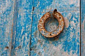 DESIGNERS ERIC OSSART AND ARNAUD MAURIERES  MOROCCO: AL HOSSOUN - DETAIL OF OLD BLUE WOODEN DOOR
