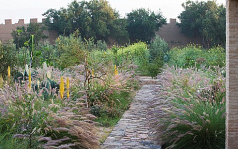 DESIGNERS_ERIC_OSSART_AND_ARNAUD_MAURIERES__MOROCCO_DAR_IGDAD__PATH_THROUGH_THE_DRY_GARDEN_WITH_PENN