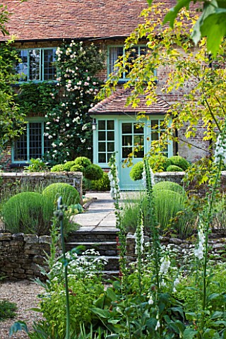 SANDHILL_FARM_HOUSE__HAMPSHIRE__DESIGNER_ROSEMARY_ALEXANDER__THE_SHADY_FONT_GARDEN_WITH_VIEW_TO_THE_