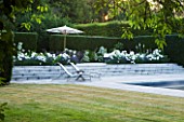 PRIVATE GARDEN, COTSWOLDS: DESIGNER ALISON HENRY - LAWN, SWIMMING POOL, TERRACE / PATIO - ROSE WINCHESTER CATHEDRAL, LAVENDER HIDCOTE.  FORMAL, WATER, CLASSIC,  ENGLISH,  GARDEN