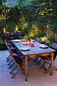 DESIGNER CHARLOTTE ROWE, LONDON: SMALL, TOWN, CITY, GARDEN, WOODEN, TABLE, CHAIRS, SEATS, PATIO, TERRACE, ENTERTAINING, SUMMER, LIGHTS, LIGHTING, CANDLES